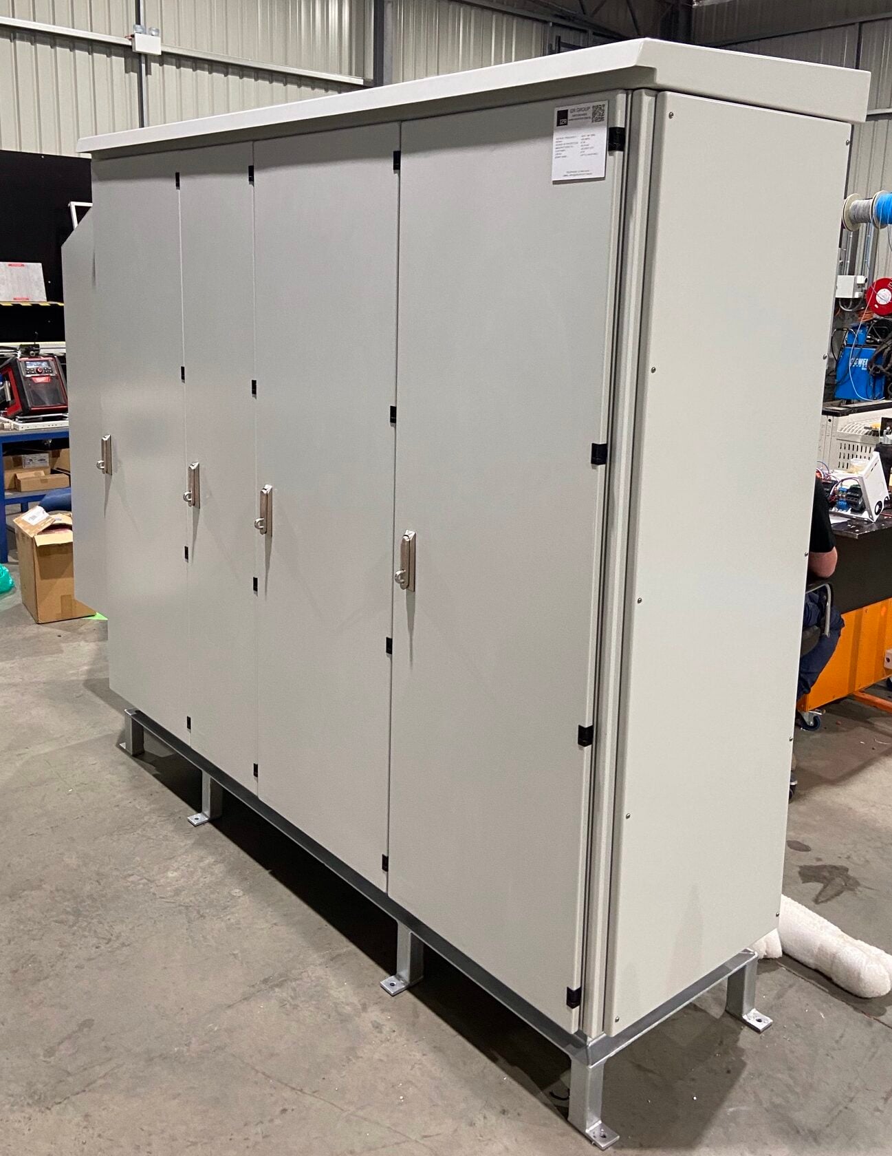 Finished outdoor rated switchboard with weather hood